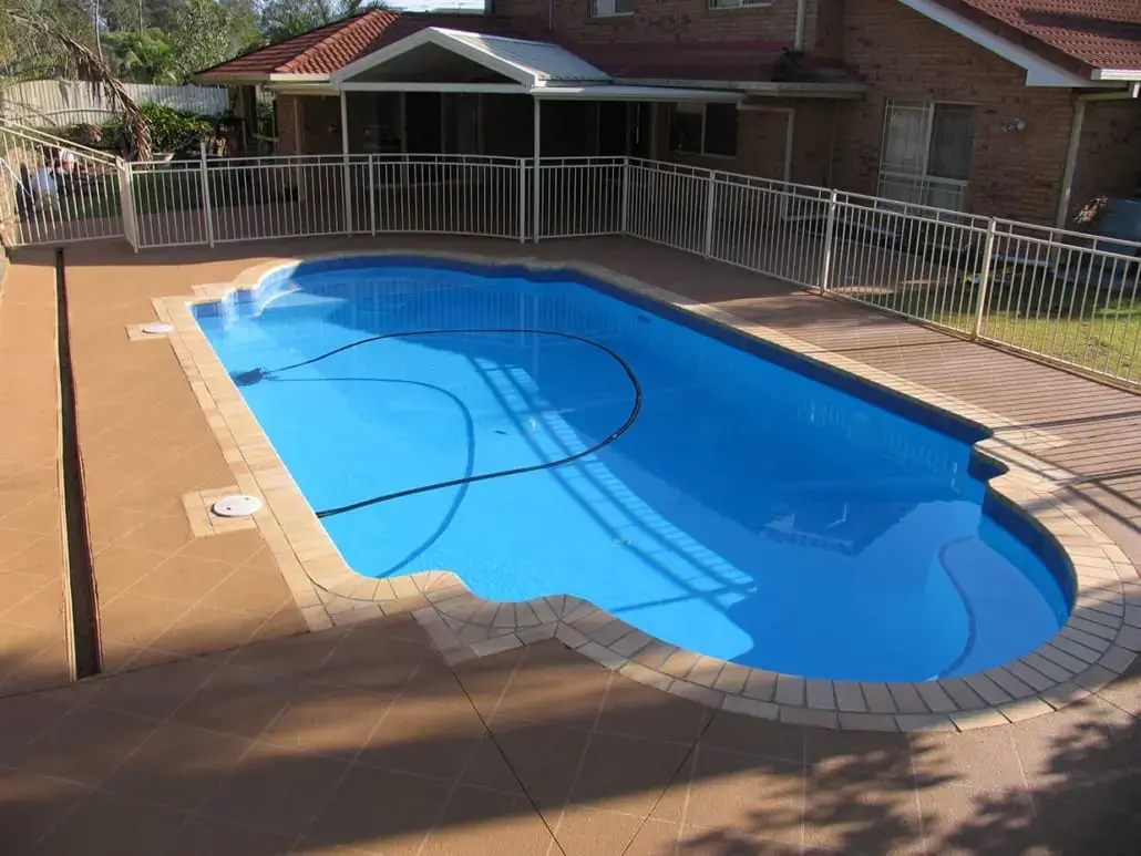 Tiled pool surround — Stencilled tile